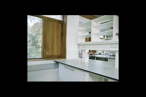 Ventilation doors provide natural ventilation to the offices and labs